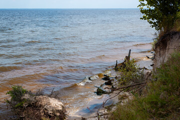 Scenery. View of the big river and the sky with clouds on a sunny day.