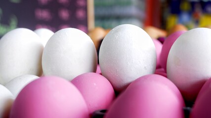 Fototapeta na wymiar easter eggs in a basket for sale