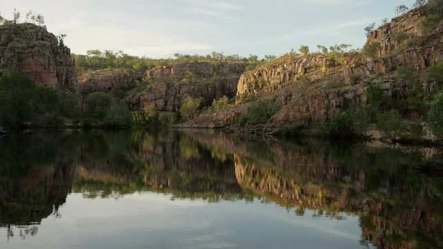 sunrise shot of reflections on the water of nitmiluk-katherine gorge at nitmiluk national park in the northern territory of australia