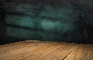 empty wooden table with smoke float up on dark background