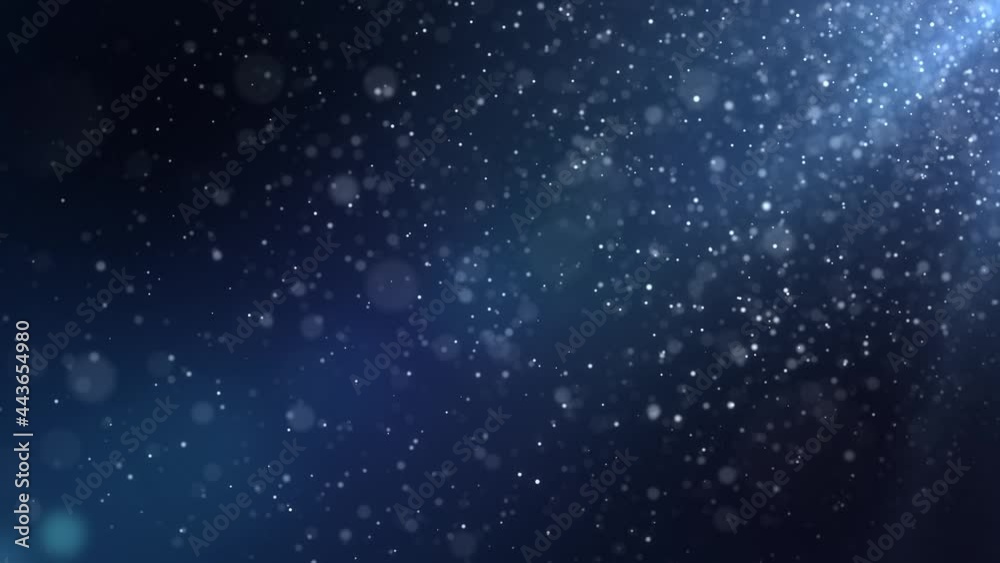 Wall mural seamless background animation of slowly flying dust particles on a blue background with shallow dept