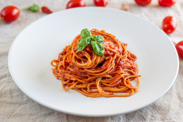 Italian spaghetti with tomato sauce, basil and extra virgin olive oil