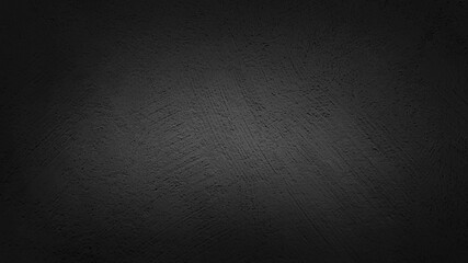 texture of vignette plastered black concrete wall.vignette vintage background of natural cement or stucco wall background use as background ,template ,banner ,advertising ,card.