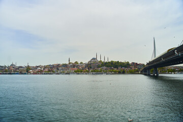Fototapeta premium Istanbul, Turkey - May 2, 2021: View across the Bosphorus to the Suleymaniye Mosque.
