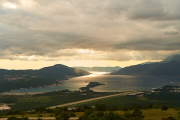 View of the Tivat Bay and the airport runway. Sunset in the Tivat Bay