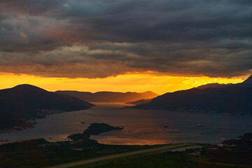 View of the Tivat Bay and the airport runway. Sunset in the Tivat Bay