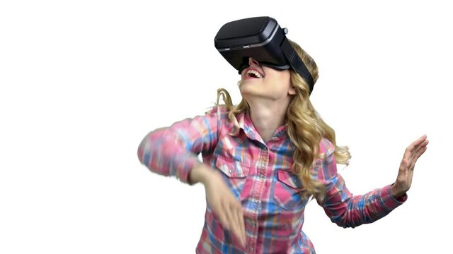 Happy woman wearing virtual reality googles.