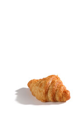 Croissant isolated in  wihite background with sunny light