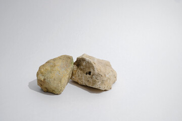 Obraz premium Stones on a light background. Podium.