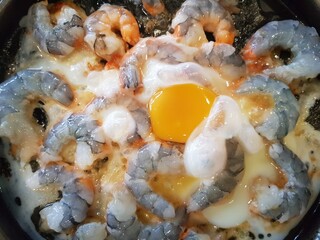 Shrimp seafood with egg for dinner.