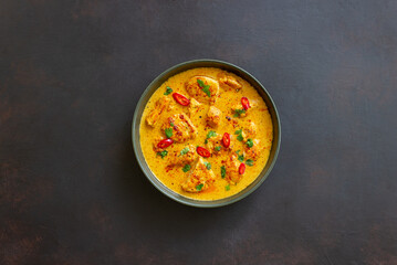 Chicken tikka masala curry with herbs and peppers. Indian food. National cuisine.