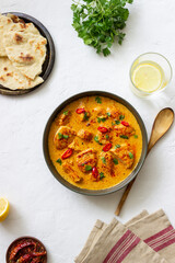 Chicken tikka masala curry with herbs and peppers. Indian food. National cuisine.