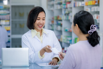 female medicine doctor hand giving prescription to patient