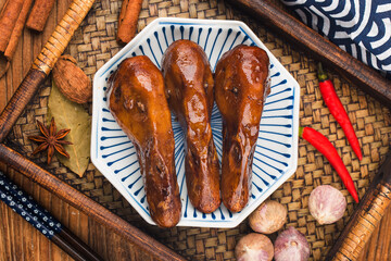 Delicious spiced duck head on a plate