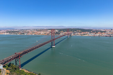 Fototapeta na wymiar Bridge 25th Of April seen from the Christ the King Santuary, Portugal