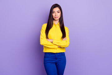 Photo of serious calm attractive young woman hold hands folded businesswoman isolated on purple color background