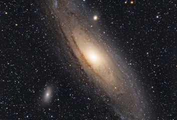The Andromeda Galaxy, also known as Messier 31, M31 or NGC 224 and the satellite galaxies M32 and...