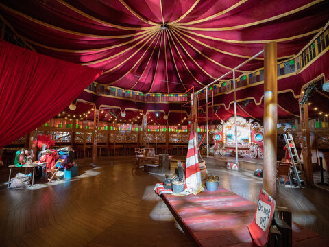 Inside circus tent with props