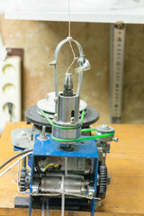 Top, head of cord knitting machine, production lace.