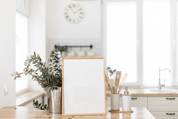 Mock up frame in kitchen interior background. Scandinavian home design.