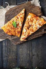 pizza fresh hot snacks Cooking, in a plate on the table, healthy food meal snack copy space food background rustic