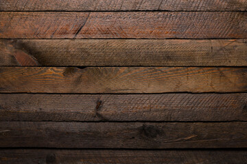 Rustic wooden table background made from old planks top view.