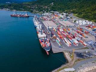 Beautiful aerial view of the Caldera Port in Puntarenas Costa Rica, full with cargo ships