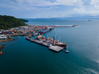 Fototapeta na wymiar Beautiful aerial view of the Caldera Port in Puntarenas Costa Rica, full with cargo ships