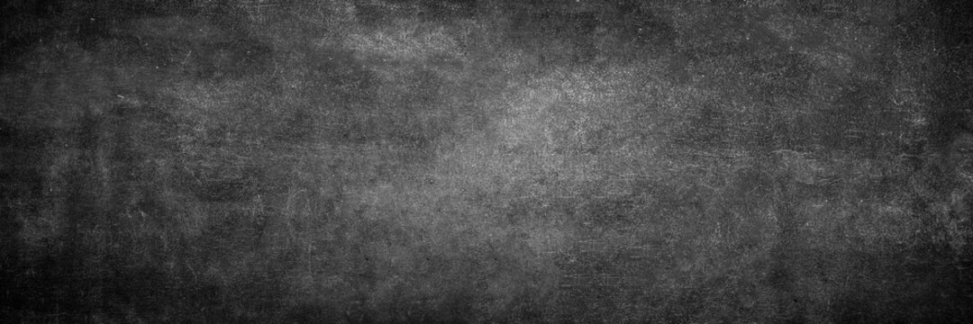 Blank wide screen Real chalkboard background texture in college concept for back to school panoramic wallpaper for black friday white chalk text draw graphic. Empty surreal room wall blackboard pale. © Art Stocker