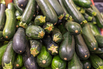 Close up view of zucchini on shelf of supermarket. Sweden.   