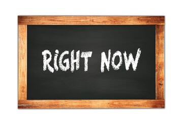 Obraz premium RIGHT NOW text written on wooden frame school blackboard.