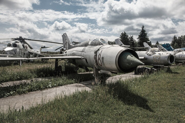 Old rusty abandoned airplane in the open air. Remnants of the former Soviet power. A military plane...