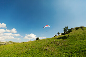 Paraglider in the mountains
