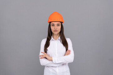 confident quality inspector. female construction worker. businesswoman in builder hardhat
