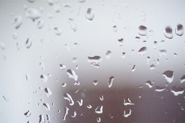 Rain drops or condensation on the glass.