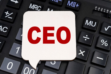 There is a white plate on the calculator with the inscription - CEO