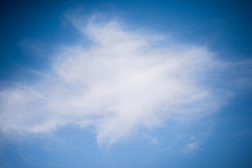 Scattered cloud clusters in a blue sky, blue sky background with white clouds,