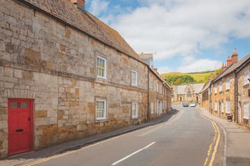 Fototapeta na wymiar Picturesque old town of the quaint and charming English village of Abbotsbury, Dorset, England, UK on a sunny summer day.