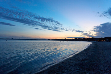 beautiful sunset on the white baltic sea beach