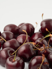 ripe cherries on a white background