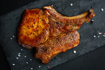 Grilled piece of pork with bone