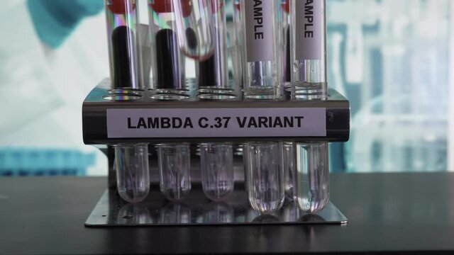 Lambda C37 Variant Test Tube Samples Being Placed In Rack. Locked Off