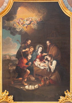 VIENNA, AUSTIRA - JUNI 24, 2021: The painting of Adoration of Shephedrs in the church Pavlanerkirche by unknown artist.