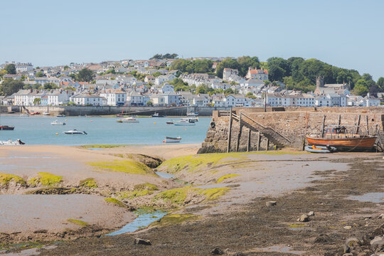 The quaint, scenic seaside fishing village of Instow with view of Appledore from across the estuary on a sunny summer day in North Devon, England, UK.