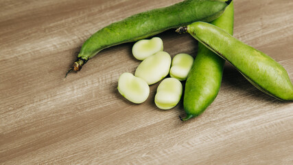 broad beans on a wooden base, these are crops from the boyacense region of colombia.