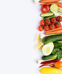 Fresh vegetables on a white plate for preparing a healthy meal. The concept of a healthy diet