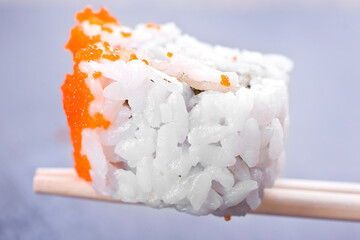 homemade sushi with baked prawn sprinkled with caviar