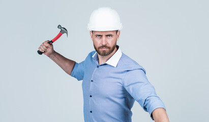business boss with beard and bristle wear hard hat hold hammer, labor day