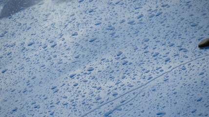 Background of raindrops on the car