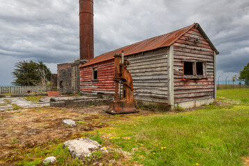 Old mining factory in the ghost town of Waiuta, New Zealand